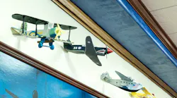 Saint Andrew’s School student paper maché planes on display at Signature Flight Support in Boca Raton