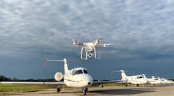 Image of a DJI Phantom Drone flying at the Golden Triangle Regional Airport.