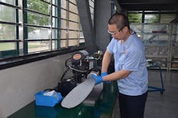 A Trained Wuhan Hangda Aero Technician Works On A Hartzell Propeller.