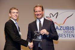 Frank Hofmann, aircraft electronics technician, and Eric Schweitzer, DIHK President Frank Hofmann, aircraft electronics technician, and Eric Schweitzer, DIHK President