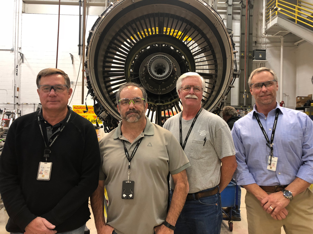From left, Jim Blesi, AMT; Ed Mason, Crew Chief; Jim Bressers, AMT; Larry Waldon, supervisor with the CFM56-5B.