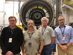 From left, Jim Blesi, AMT; Ed Mason, Crew Chief; Jim Bressers, AMT; Larry Waldon, supervisor with the CFM56-5B.