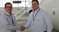 New King Aerospace Commercial Corporation General Manager (left) shakes hands with company President Jarid King. New King Aerospace Commercial Corporation General Manager (left) shakes hands with company President Jarid King.