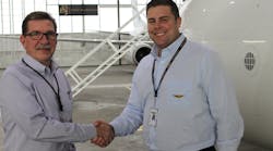 New King Aerospace Commercial Corporation General Manager (left) shakes hands with company President Jarid King.