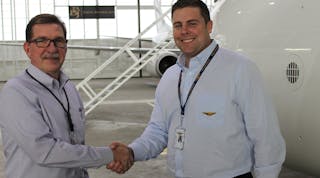 New King Aerospace Commercial Corporation General Manager (left) shakes hands with company President Jarid King.