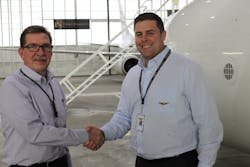 New King Aerospace Commercial Corporation General Manager (left) shakes hands with company President Jarid King. New King Aerospace Commercial Corporation General Manager (left) shakes hands with company President Jarid King.