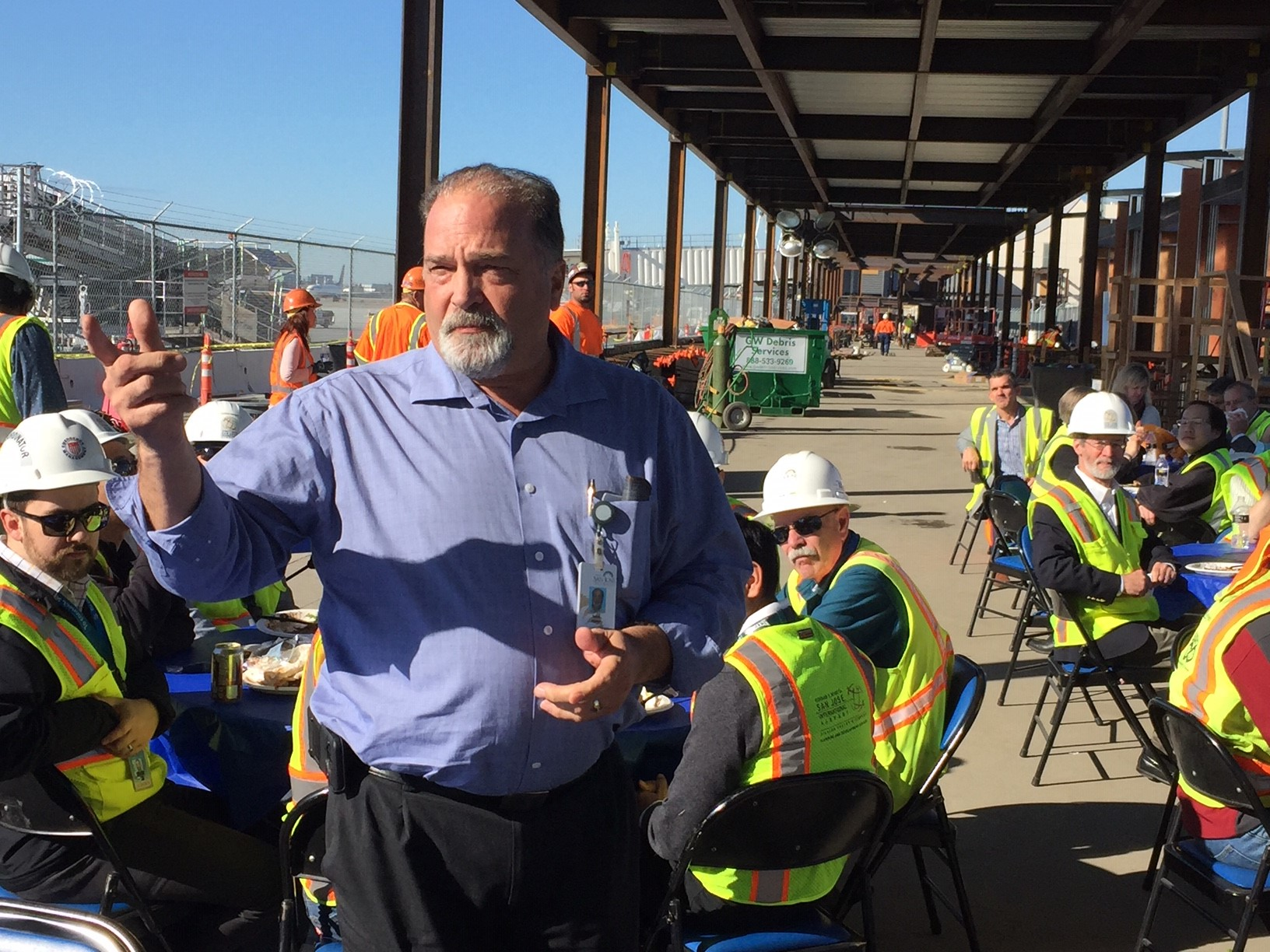 SJC Director of Aviation John Aitken congratulates interim gates project team on reaching key milestone.