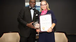 Dr. Sherman Gay (LASC) presenting the 2018 Sustainability Public Agency of the Year Award to Tamara McCrossen-Orr (Chief Planning Officer, Office of Sustainability, Los Angeles World Airports).