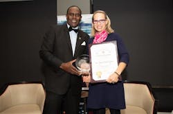 Dr. Sherman Gay (LASC) presenting the 2018 Sustainability Public Agency of the Year Award to Tamara McCrossen-Orr (Chief Planning Officer, Office of Sustainability, Los Angeles World Airports).