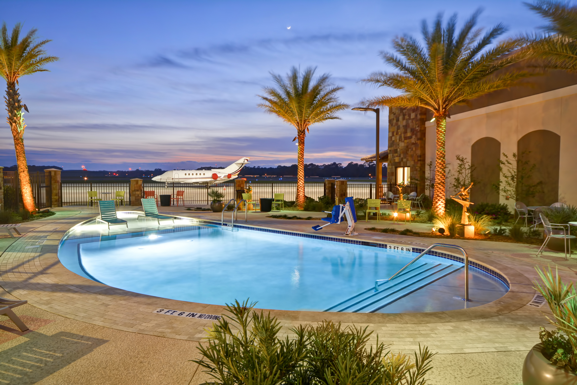 The hotel pool at Golden Isles Aviation is designed to meet the overall theme of aviation.