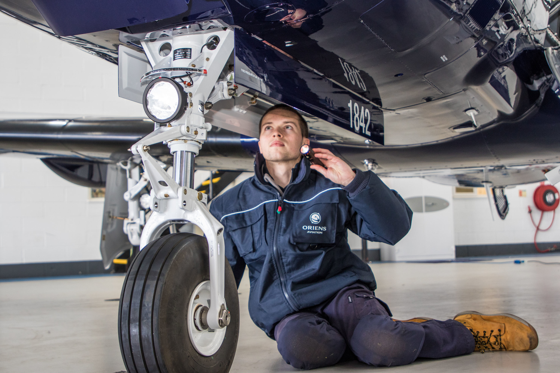 A young engineer at work at BBGA member company Oriens Aviation Pilatus Service Center at London Biggin Hill Airport.