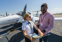 Abigail Pasmore, flight instructor, worked with flight student Eric Tetteh on the Embry-Riddle flight line in 2016. Tetteh is now an instructor pilot. Abigail Pasmore, flight instructor, worked with flight student Eric Tetteh on the Embry-Riddle flight line in 2016. Tetteh is now an instructor pilot.