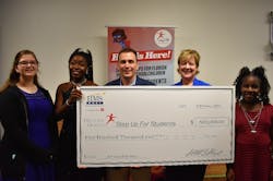 HMSHost celebrated with Step Up For Students again on February 28, 2019 at Impact Christian Academy in Jacksonville, Florida. Pictured (adults from left to right) are HMSHost Vice President of Business Development Stephen Douglas and Step Up For Students COO Anne White. They are joined by students who are benefiting from the scholarship. HMSHost celebrated with Step Up For Students again on February 28, 2019 at Impact Christian Academy in Jacksonville, Florida. Pictured (adults from left to right) are HMSHost Vice President of Business Development Stephen Douglas and Step Up For Students COO Anne White. They are joined by students who are benefiting from the scholarship.