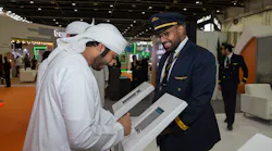 Abdulrham Alamiri, First Officer at Etihad Airways, introducing the career programs to visitors at Etihad stand during the UAE Careers-Dubai.