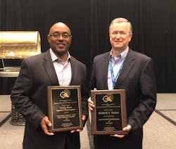 Next to Rick Tucker is George Davis of Signature Flight Support (right) who was recognized as the SEC-AAAE Corporate Member of the Year for his work with non-profit organization FlyQuest on the Mobile Aviation classroom.