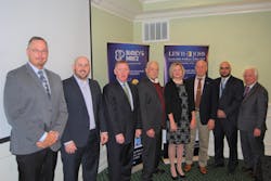 Shelley LaRose-Arken (fourth from right), Commissioner, Long Island MacArthur Airport, was the guest speaker at the LIMBA (Long Island Metro Business Action) meeting on March 29 at the Courtyard by Marriott in Ronkonkoma. Also pictured (left to right): Fin B. Bonset, C.M., Director of Aviation Services, VHB Engineering; J. Carlos Vargas, RLA CLARB ISA, Landscape Architect, VHB Engineering; Robert W. Doyle, Jr., Partner, Lewis Johs Avallone Aviles, LLP; Ernie Fazio, Chairman, LIMBA; Ken Nevor, Member, LIMBA; Rob Schneider, Deputy Commissioner, Long Island MacArthur Airport; and Bill Miller, Treasurer, LIMBA. VHB Engineering was the event&rsquo;s sponsor and Lewis Johs is the annual LIMBA sponsor.