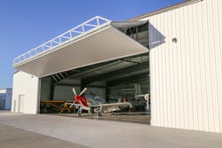 Reasons to replace an oversized door include more than just an obvious non-working door. A building owner might also replace a door to accommodate the growing size of machinery, which requires larger doors; or when they’re looking for a cosmetic update to increase the value of the building. Reasons to replace an oversized door include more than just an obvious non-working door. A building owner might also replace a door to accommodate the growing size of machinery, which requires larger doors; or when they’re looking for a cosmetic update to increase the value of the building.