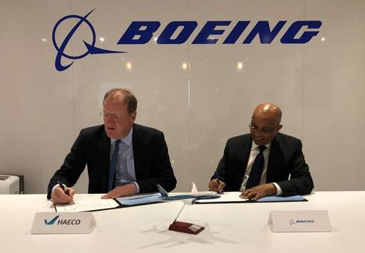 James Barrington, CEO of HAECO, and Anbessie Yitbarek, vice president of Commercial Sales and Marketing for Boeing Global Services, sign a multi-year consumables and expendables services agreement at MRO Americas.