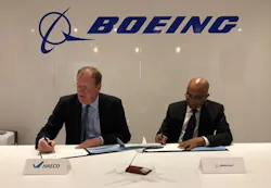 James Barrington, CEO of HAECO, and Anbessie Yitbarek, vice president of Commercial Sales and Marketing for Boeing Global Services, sign a multi-year consumables and expendables services agreement at MRO Americas.