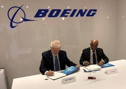Norbert Marx, GAMECO CEO and general manager, and Anbessie Yitbarek, vice president of Commercial Sales and Marketing for Boeing Global Services sign a MRO services agreement at MRO Americas.