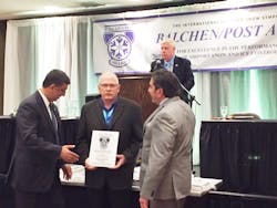 Gary Lamb (center), EIA Manager, Airside and Field Maintenance, is presented with the 2019 Balchen/Post Award by Alex Kashani (left) and Joe Guarino (right) both of the Northeast Chapter, American Association of Airport Executives. Gary Lamb (center), EIA Manager, Airside and Field Maintenance, is presented with the 2019 Balchen/Post Award by Alex Kashani (left) and Joe Guarino (right) both of the Northeast Chapter, American Association of Airport Executives.