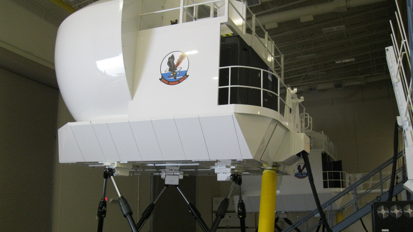 CAE will design and manufacture P-8 simulators for the Royal Air Force and Indian Navy similar to the P-8A operational flight trainers shown above already delivered to the U.S. Navy.