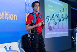 Florian Eggenschwiler, Head of Innovation at Swissport International, demonstrates the LiftSuit