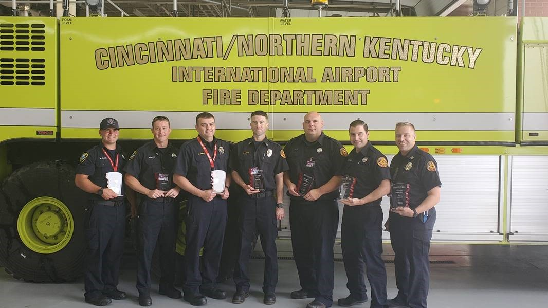 Pictured left to right receiving the Lifesavers EMS Award: Keith Devlin, Patrick Handley, Darren Johnston, Brain Burbrink, Anthony Isaacs, Danny Schneider and Jeff Goshorn. Also on the response team, but not pictured, Dave Kelley and Kevin Kleier.