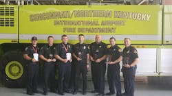 Pictured left to right receiving the Lifesavers EMS Award: Keith Devlin, Patrick Handley, Darren Johnston, Brain Burbrink, Anthony Isaacs, Danny Schneider and Jeff Goshorn. Also on the response team, but not pictured, Dave Kelley and Kevin Kleier.