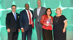 LAWA Chief Management Analyst Georginnah Navarrete (second from right) accepts the Best Airport Concessions Transformation award from ACI-NA.