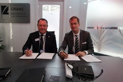 Gregg Herman, VP Sales and Marketing (left) and Bart Reijnen, Chief Executive Officer, Satair sign the contract at Paris Air Show. Gregg Herman, VP Sales and Marketing (left) and Bart Reijnen, Chief Executive Officer, Satair sign the contract at Paris Air Show.