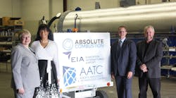 From left to right: Laura Kilcrease, CEO of Alberta Innovates, Koleya Karringten, CEO of Absolute Combustion International, Steve Maybee, VP of Operations and Infrastructure, Edmonton International Airport and Rollie Dykstra, VP of Investments, Alberta Innovates, pose in front of the new Absolute Combustion International-SM1000 portable aircraft heater, tested and produced in Alberta.