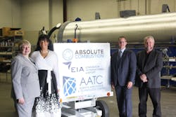 From left to right: Laura Kilcrease, CEO of Alberta Innovates, Koleya Karringten, CEO of Absolute Combustion International, Steve Maybee, VP of Operations and Infrastructure, Edmonton International Airport and Rollie Dykstra, VP of Investments, Alberta Innovates, pose in front of the new Absolute Combustion International-SM1000 portable aircraft heater, tested and produced in Alberta.