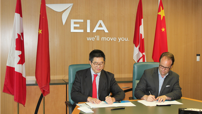 Signing the MOU from left to right: Steve Loo, Executive Director of Plant Box in China, Myron Keehn, EIA Vice President of Air Service and Commercial Development. Group shot at bottom, back row L-R, Ricky Shen, Plant Box, David Lu, Plant Box, Kelly Vandenberghe, Leduc County Deputy Mayor, Malcolm Bruce, CEO Edmonton Global, John Kim, Plant Box.