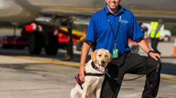 GNV K9 Beamer will receive a special protective vest from Vested Interest in K9s Inc, sponsored by Fairwood Pet Center in Renton, Wash. Left to Right: K9 Beamer and her handler, Jason Berger, GNV’s K9 Handler (Explosives) and Airport Security Coordinator