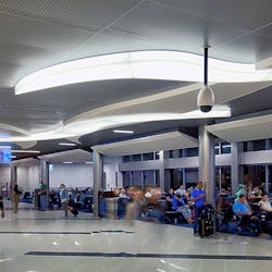 The two-year, $112.7 million contract to recast and brighten up the hold rooms included removing existing storefront systems and portions of exterior metal panels to install floor-to-ceiling glass, upgrade lighting, replace flat acoustical ceilings with sloped metal ceiling panels, install new carpet and repaint the hold rooms.