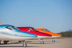 The HondaJet Elite in Ice Blue, Ruby Red and Monarch Orange at Honda Aircraft Company&apos;s headquarters in Greensboro, NC.