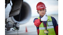A Worker Of Swissport In The Japanese Tokyo Airport A Worker Of Swissport In The Japanese Tokyo Airport