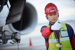 A Worker Of Swissport In The Japanese Tokyo Airport