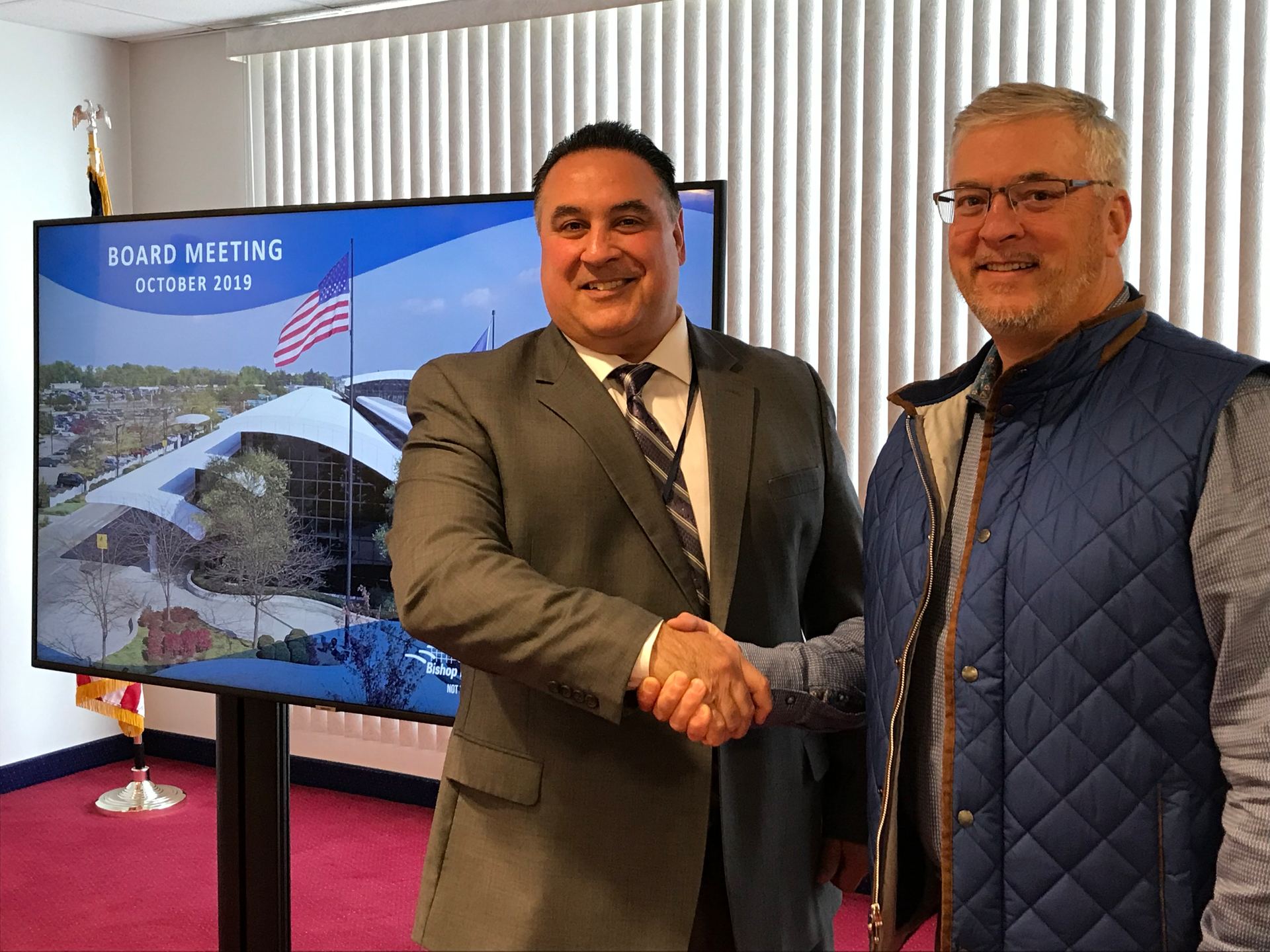 Airport Director, Nino Sapone, On Left, Chairperson Of The Board, Win Cooper, On The Right