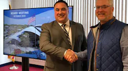 Airport Director, Nino Sapone, On Left, Chairperson Of The Board, Win Cooper, On The Right