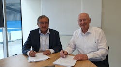 B2A Technology President Pierre Marol (l) and Glidepath Executive Chairman, Sir Ken Stevens (r) sign the agreement.