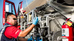 An American Aero FTW employee performs an inspection.