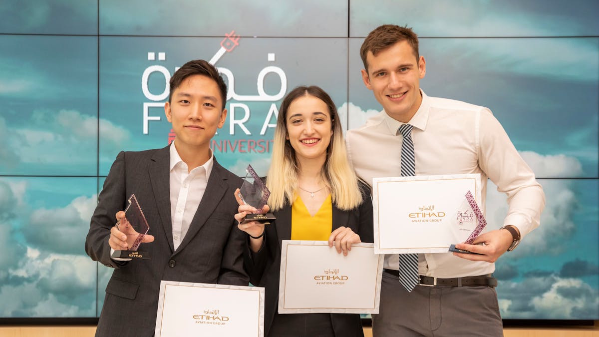 Team We Love Layovers From Nyu Abu Dhabi Emerge As The Winners Of The 2019 Fikra University Competition Sangjin Lee, Teona Ristova And Vladyslav Cherevkov (l To R)