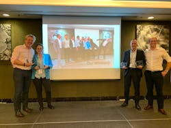 Ariaen Zimmerman (left), Executive Director, Cargo iQ, and Chris Davies (right), Technology and Product Manager, Cargo iQ, with the winners of the Q-Rally challenge Ariaen Zimmerman (left), Executive Director, Cargo iQ, and Chris Davies (right), Technology and Product Manager, Cargo iQ, with the winners of the Q-Rally challenge