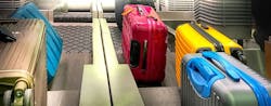 Colorful Suitcases Check In Counter 767x300 5df907e7504c5 Colorful Suitcases Check In Counter 767x300 5df907e7504c5
