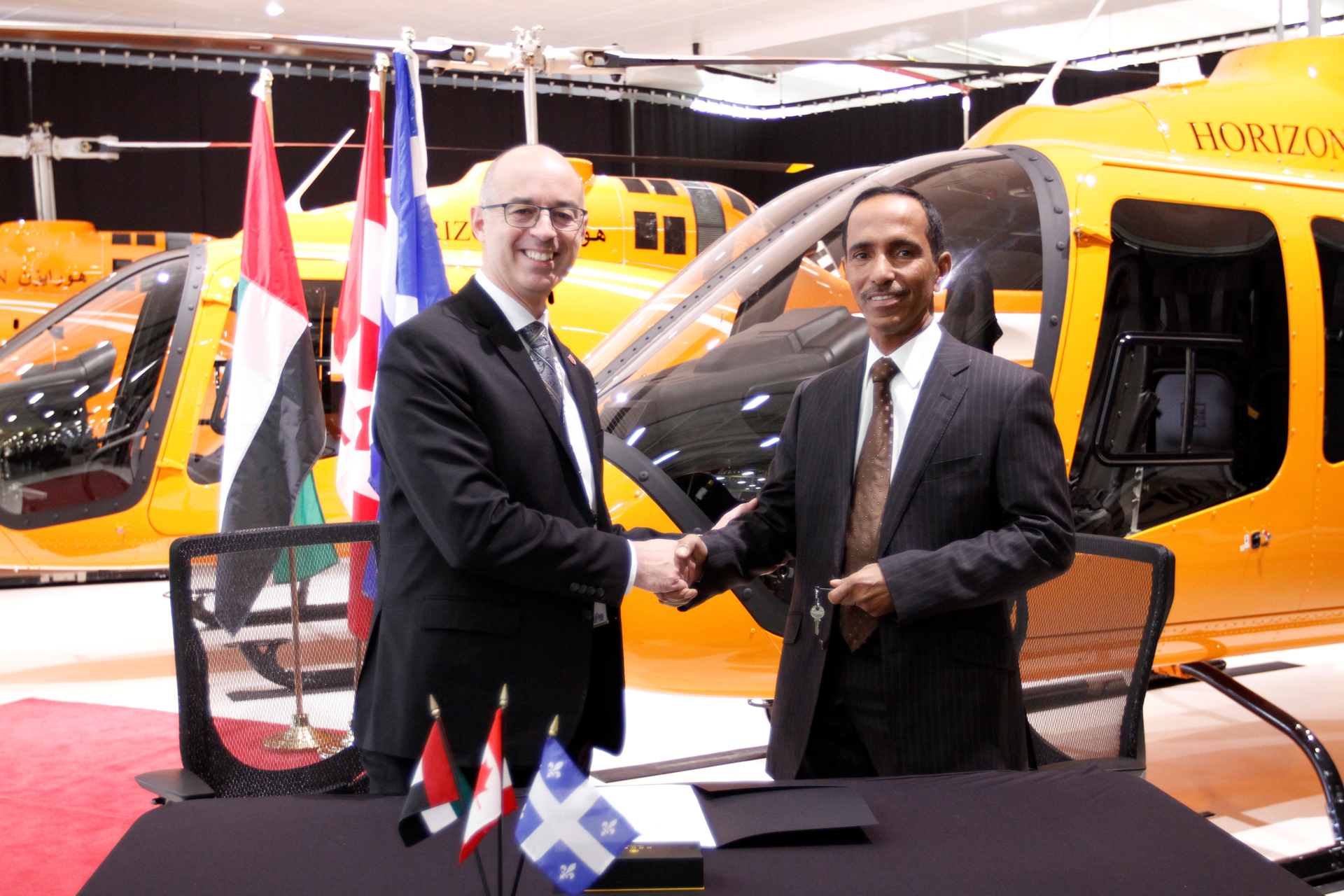 Steeve Lavoie, president of Bell Helicopter Textron Canada Ltd and Hareb Al Dhaheri, CEO Horizon Flight Academy International.