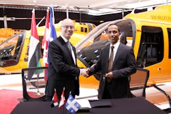 Steeve Lavoie, president of Bell Helicopter Textron Canada Ltd and Hareb Al Dhaheri, CEO Horizon Flight Academy International.