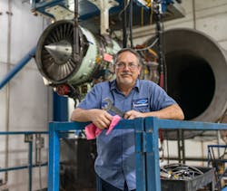 Employee rigs engine for final testing at StandardAero&rsquo;s Houston, Texas MRO facility