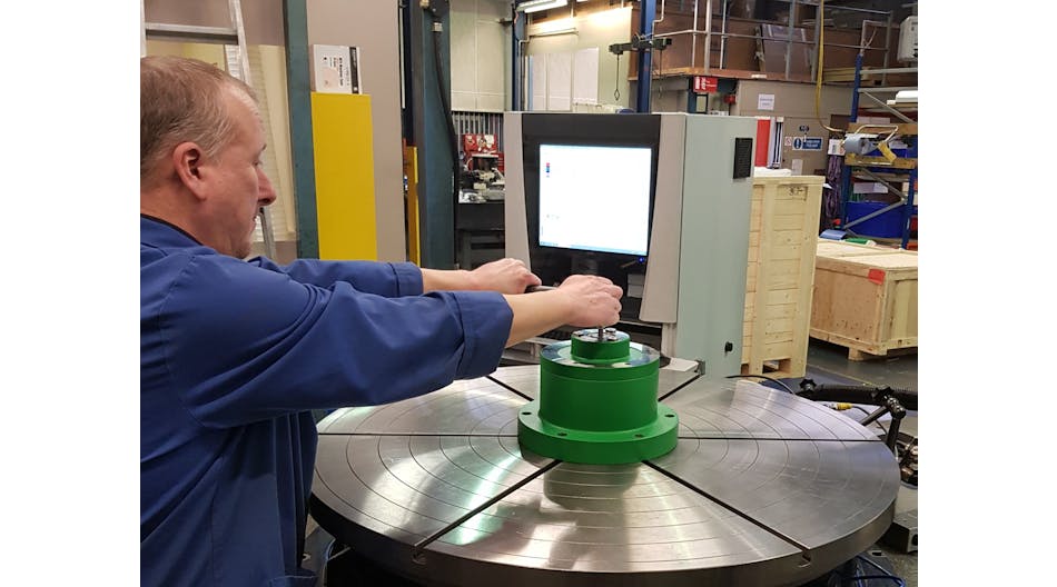 RPI engineer demonstrating Curvic tooling which significantly reduces set up times and helps to improve the overall performance of the meas